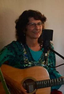 Steve's wife, Rachel Anne Goodman, playing guitar